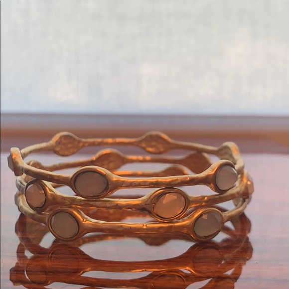 Gold tone, blue and white stone bangles.      (LA) - Picture 5 of 6